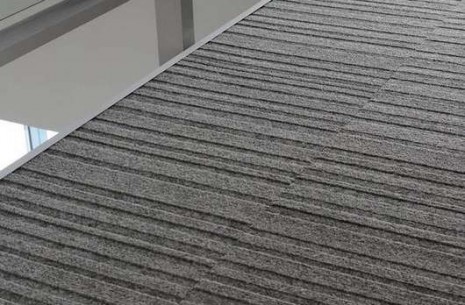 grey carpet tiles up close