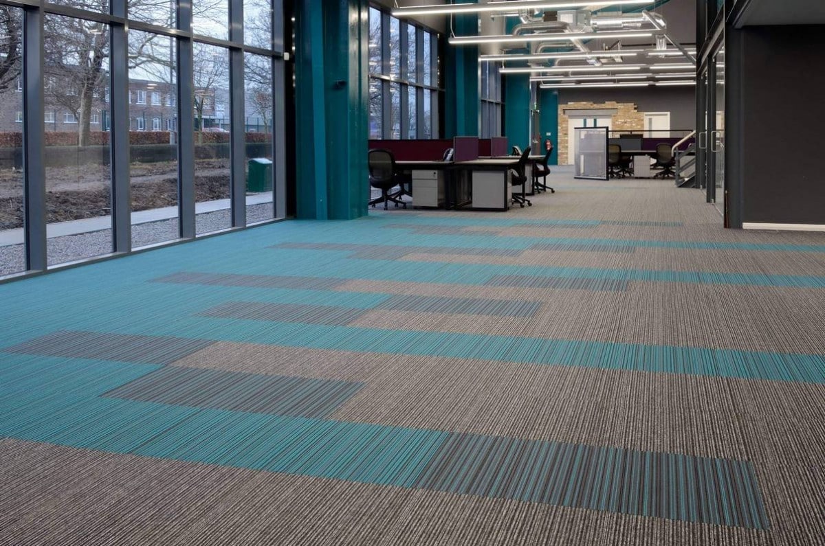 office carpeting in blue and grey The variety of office flooring we provide include cut pile carpet tiles, carpet planks, and carpet sheets which are all durable and provide longevity